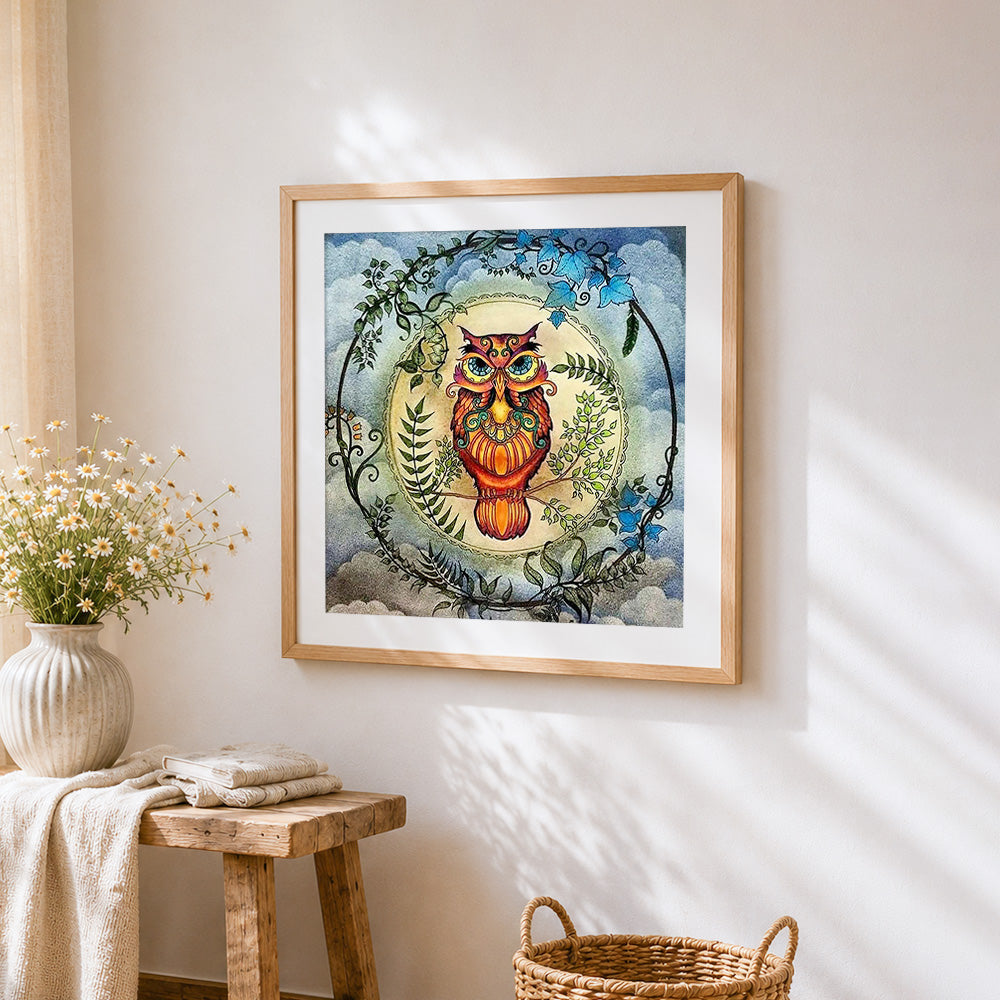 Owl among the vines cross stitch artwork displayed on wall as home decor
