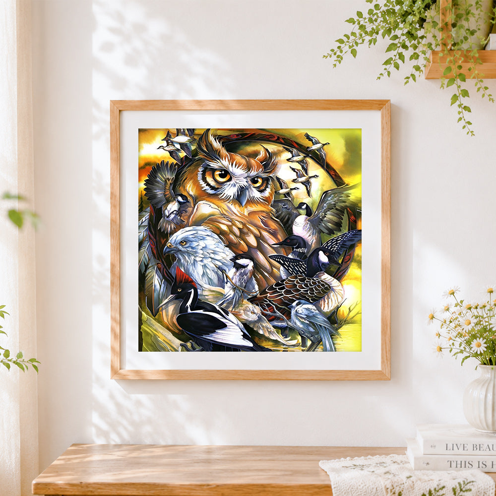 Finished owl and bird collection cross stitch artwork displayed