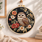 Owl on dark floral embroidery hoop wall art displayed as warm and cosy handmade home decor