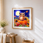 Owl on pumpkins and sunflowers cross stitch artwork displayed on wall as home decor