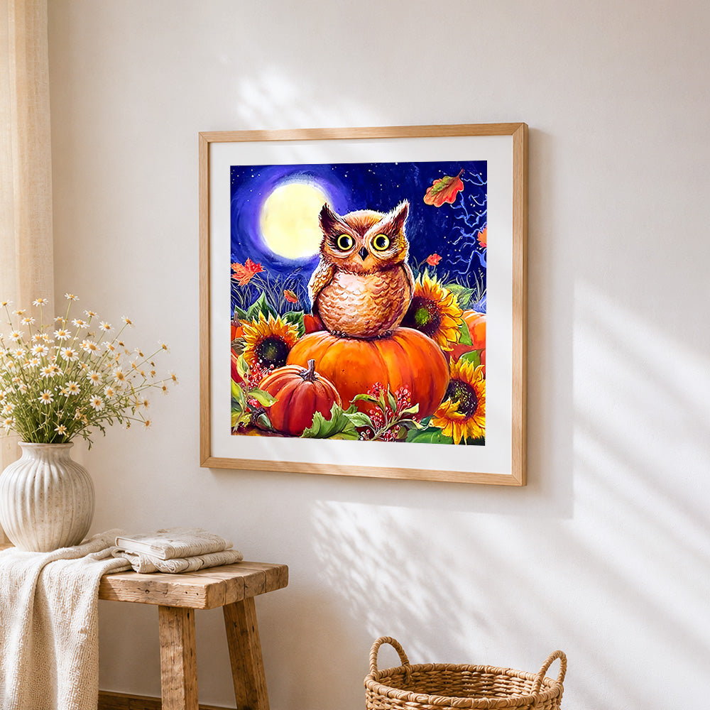 Owl on pumpkins and sunflowers cross stitch artwork displayed on wall as home decor
