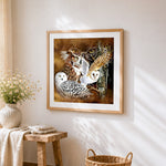 Owl species collage cross stitch artwork displayed on wall as home decor