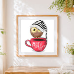 Finished owl with coffee and bobble hat cross stitch artwork displayed