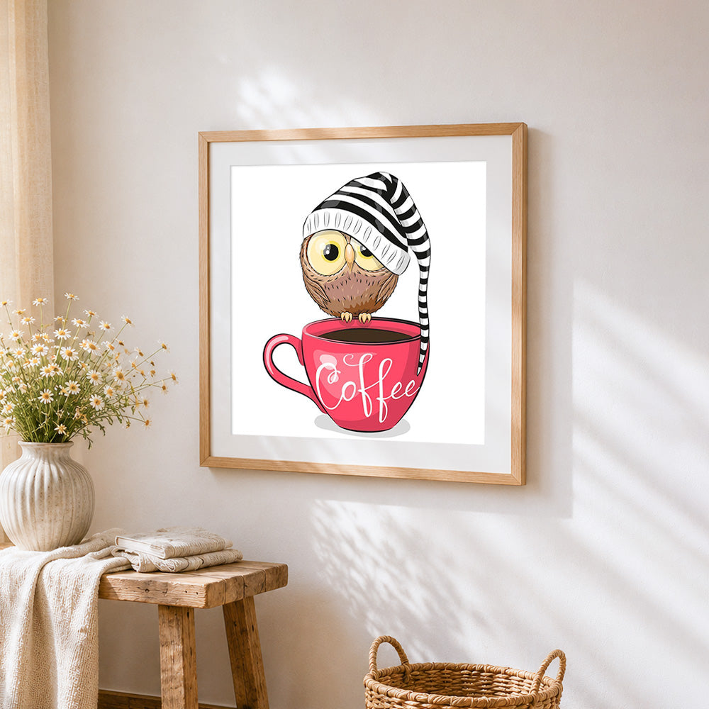 Owl with coffee and bobble hat cross stitch artwork displayed on wall as home decor