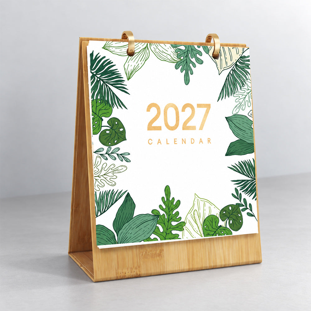 Botanical Greens Paint by Numbers Calendar displayed upright on its wooden stand with tropical leaf illustrations