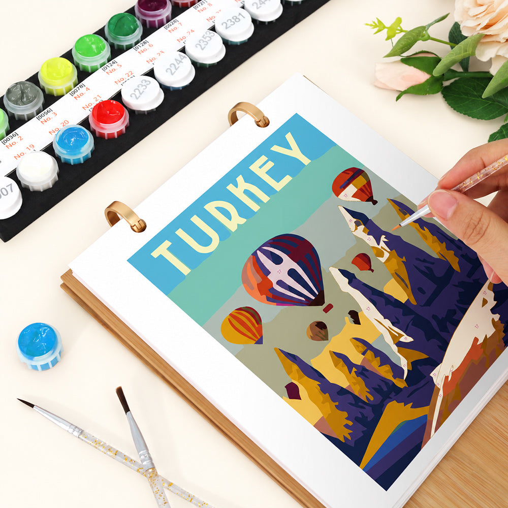 Close-up of painting hot air balloons over the Turkish landscape on the Scenic Getaways calendar