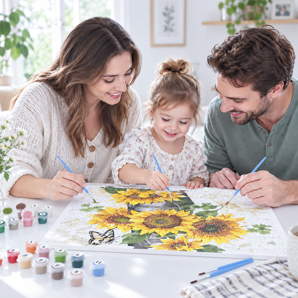 Family enjoying a paint by numbers project together at home