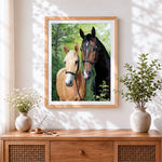 Finished pair of horses portrait cross stitch artwork displayed