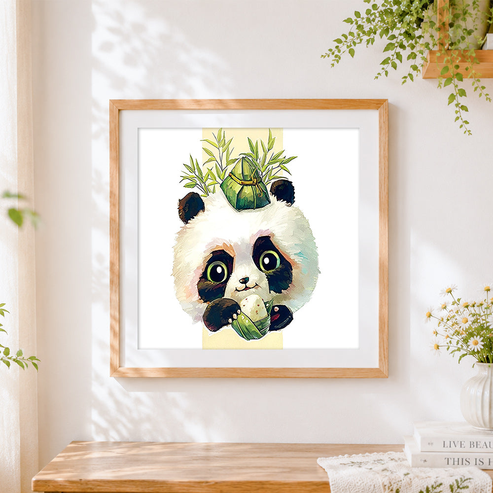 Finished panda eating rice dumpling cross stitch artwork displayed