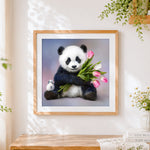 Finished panda hugging pink tulips cross stitch artwork displayed