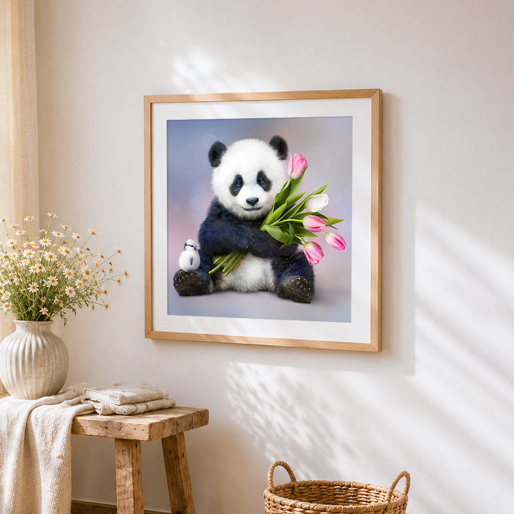Panda hugging pink tulips cross stitch artwork displayed on wall as home decor