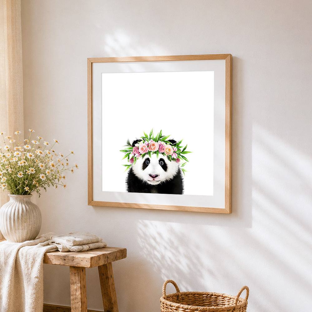 Panda with floral crown cross stitch artwork displayed on wall as home decor