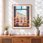 Finished parisian patisserie window view cross stitch artwork displayed