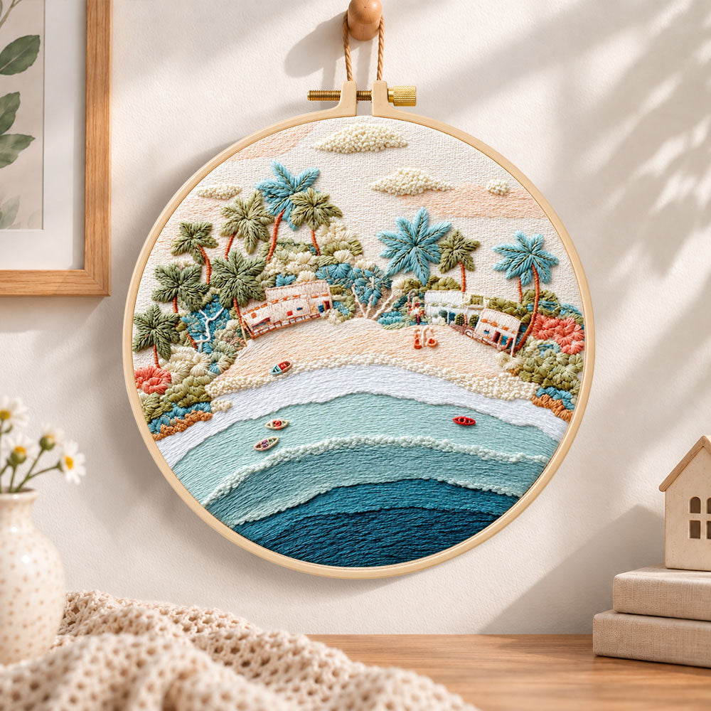 Pastel beach coast embroidery hoop wall art displayed as warm and cosy handmade home decor