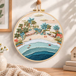 Pastel beach coast embroidery hoop wall art displayed as warm and cosy handmade home decor