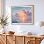 Pastel clouds and calm sea cross stitch artwork displayed on wall as home decor