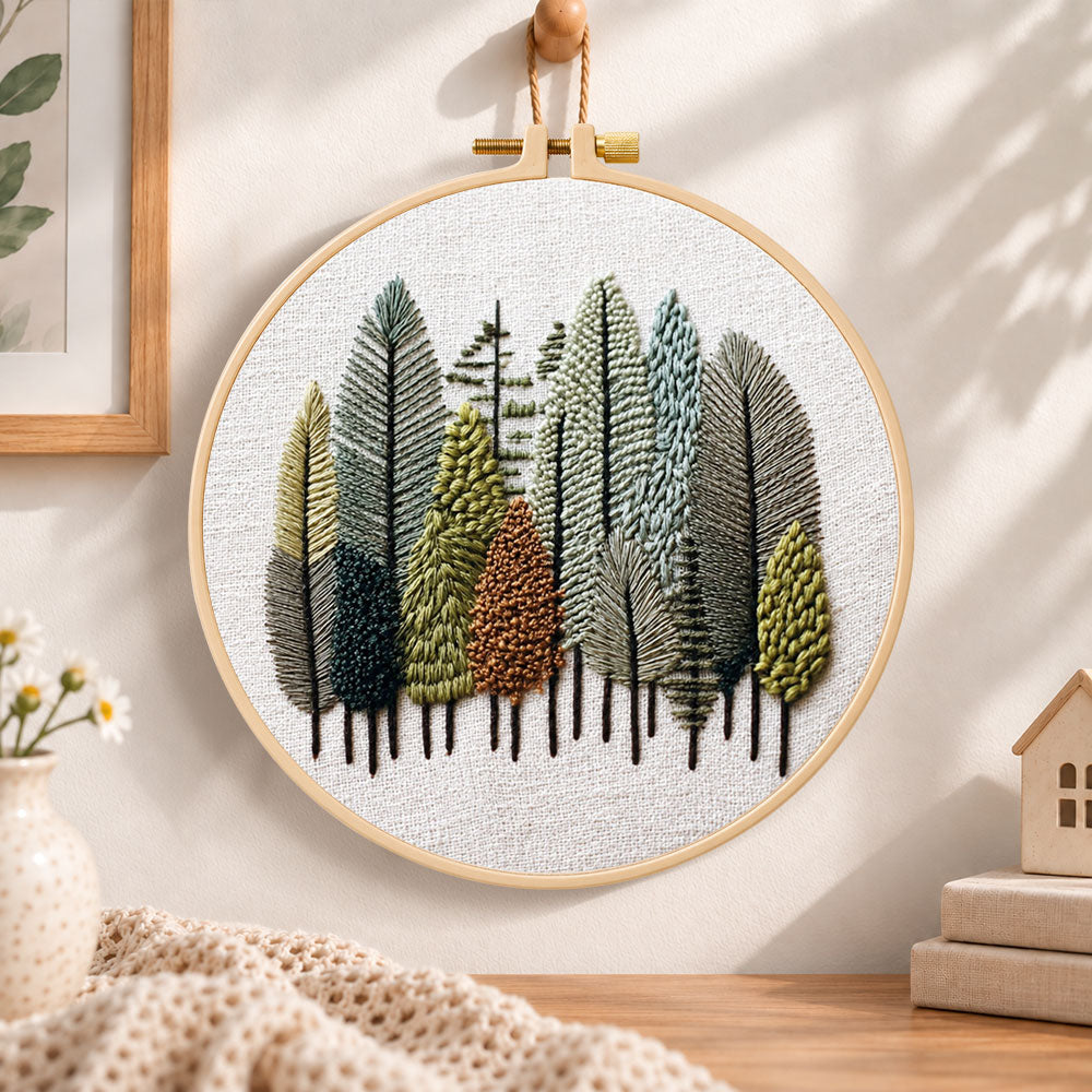 Pastel forest grove embroidery hoop wall art displayed as warm and cosy handmade home decor