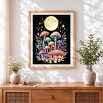 Finished pastel mushrooms under the moon cross stitch artwork displayed