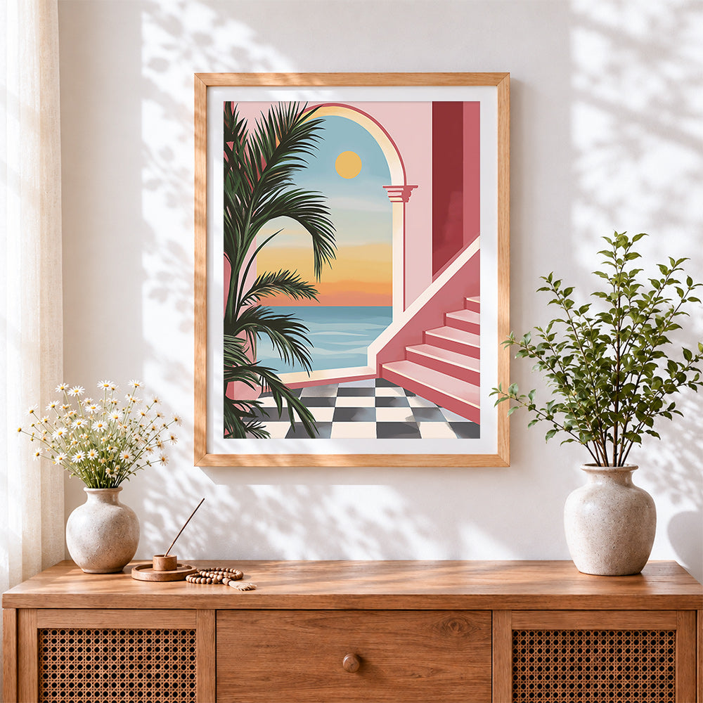 Finished pastel pink archway and palm cross stitch artwork displayed
