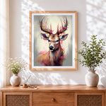 Finished pastel rose floral deer cross stitch artwork displayed