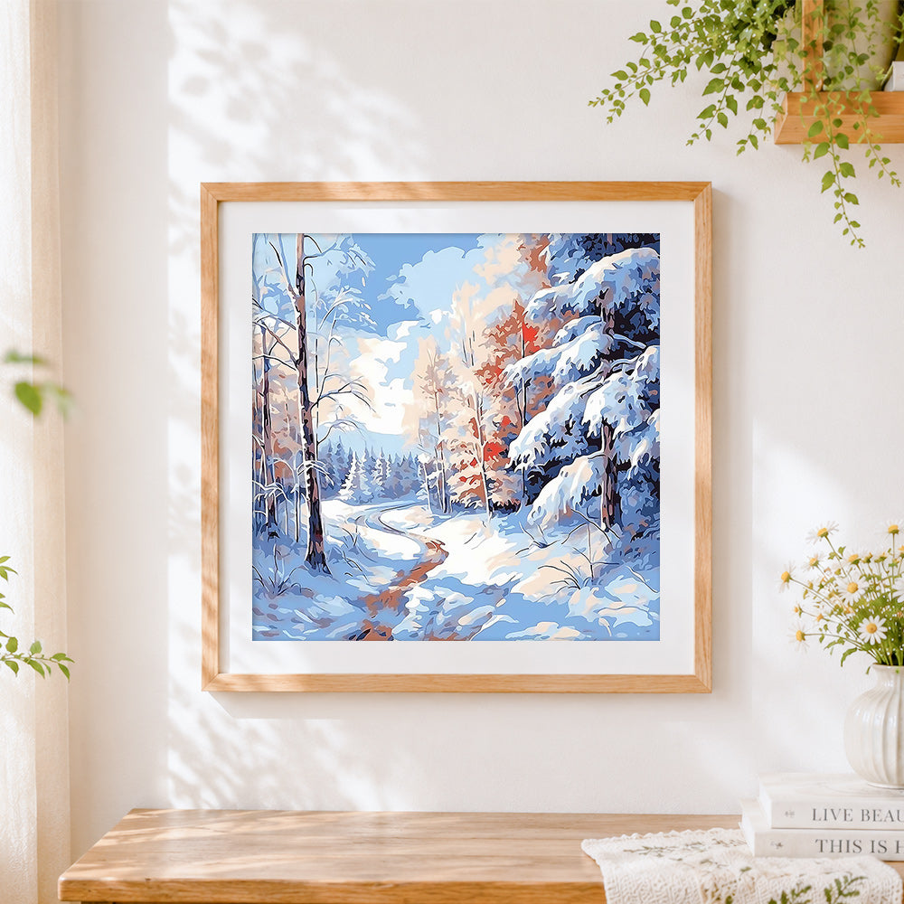 Finished pastel snowy forest cross stitch artwork displayed