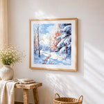 Pastel snowy forest cross stitch artwork displayed on wall as home decor