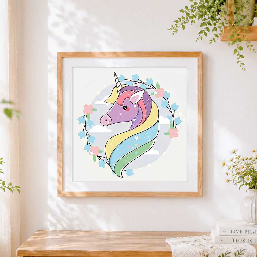 Finished pastel unicorn portrait with floral wreath cross stitch artwork displayed
