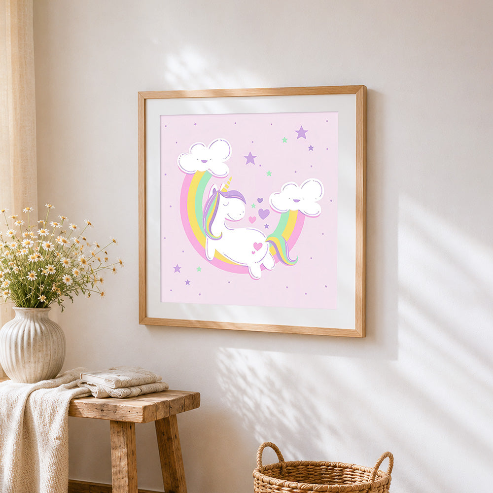Pastel unicorn with rainbow and clouds cross stitch artwork displayed on wall as home decor