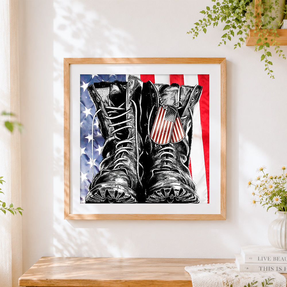 Finished patriotic military boots cross stitch artwork displayed