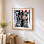 Patriotic military boots cross stitch artwork displayed on wall as home decor