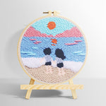 Peaceful beach view with couple punch needle kit for beginners