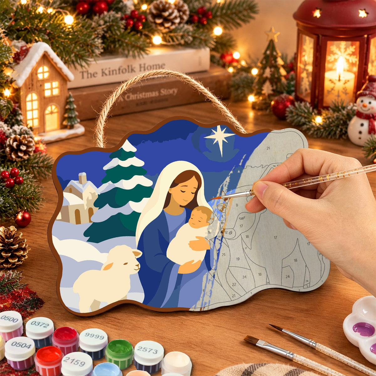 Peaceful winter nativity paint by numbers door hanger painting process