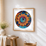 Peacock and lotus mandala cross stitch artwork displayed on wall as home decor