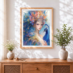 Finished peacock queen with blue eyes cross stitch artwork displayed