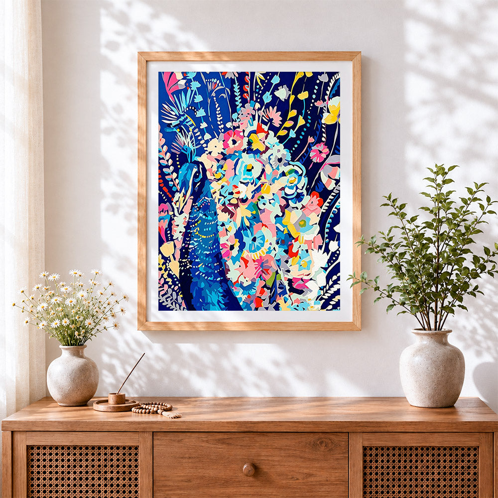 Finished peacock surrounded by colourful flowers cross stitch artwork displayed