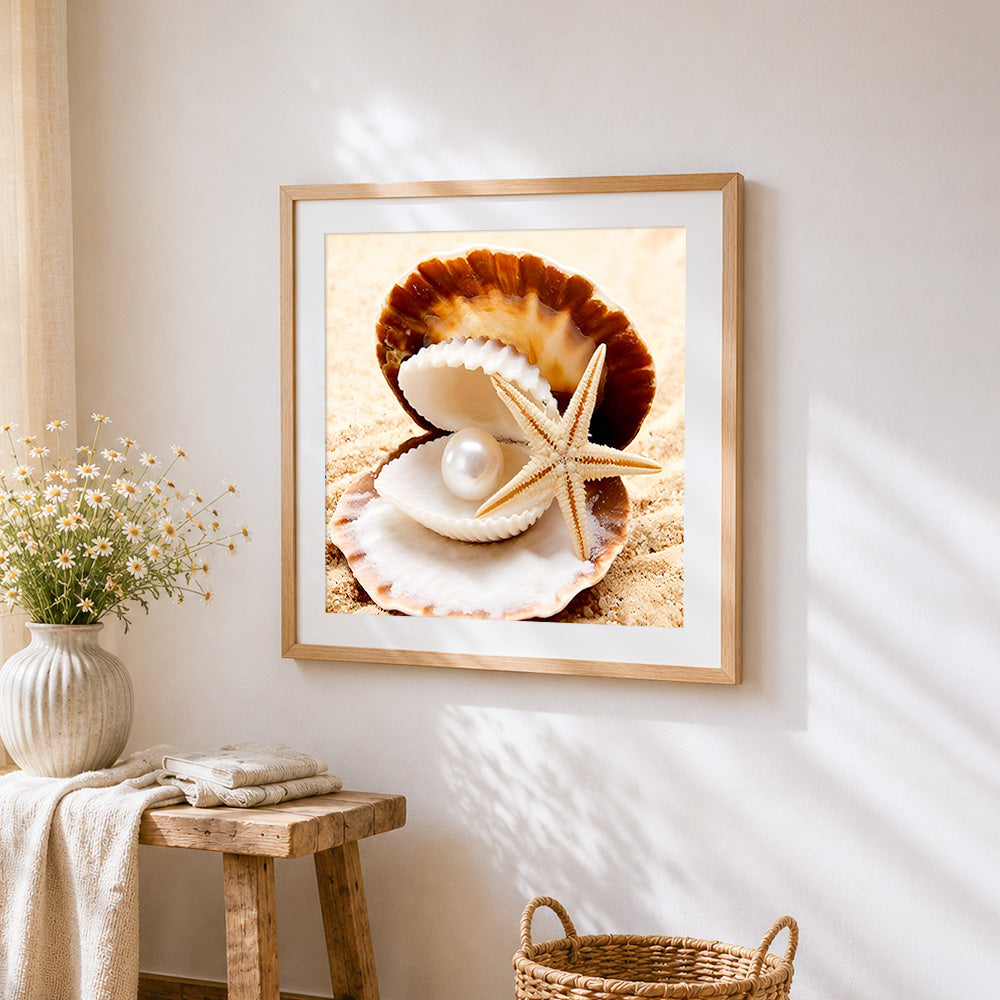 Pearl and starfish on the beach cross stitch artwork displayed on wall as home decor