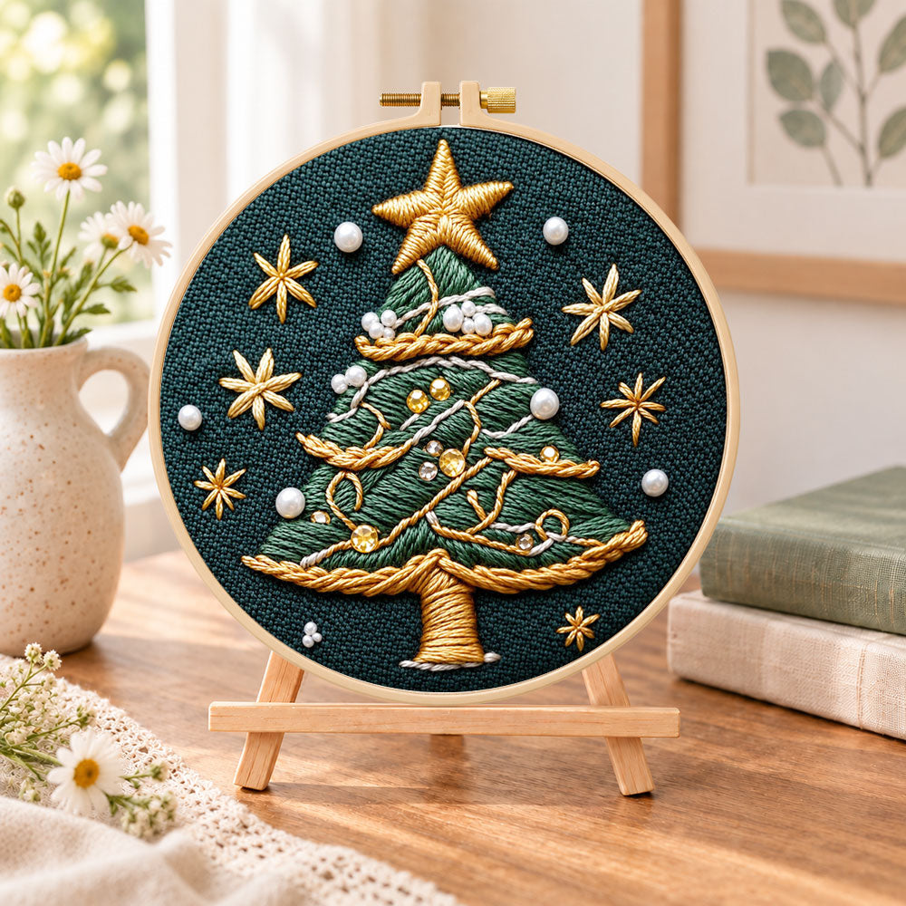 Pearl decorated tree embroidery kit finished hoop displayed on a wooden stand as cosy tabletop decor