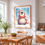 Penguin in santa hat and scarf cross stitch artwork displayed on wall as home decor