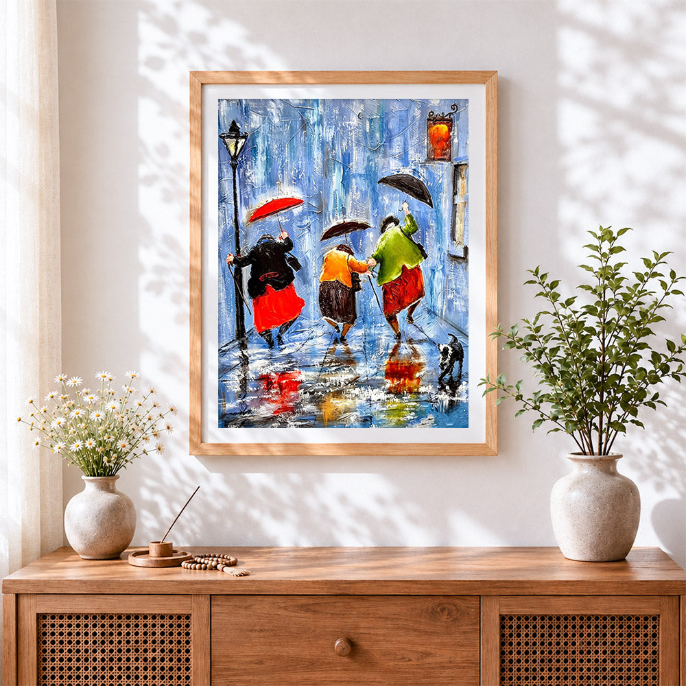 Finished people with umbrellas in the rain cross stitch artwork displayed