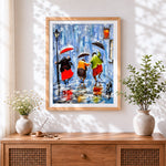 Finished people with umbrellas in the rain cross stitch artwork displayed