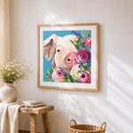 Pig with flowers cross stitch artwork displayed on wall as home decor