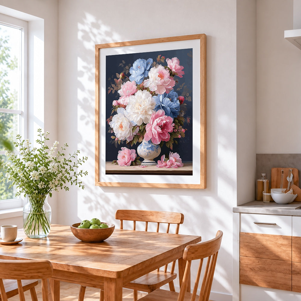 Pink and blue peonies in a chinoiserie vase cross stitch artwork displayed on wall as home decor