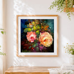 Finished pink and orange roses cross stitch artwork displayed