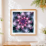 Finished pink and purple kaleidoscope mandala cross stitch artwork displayed