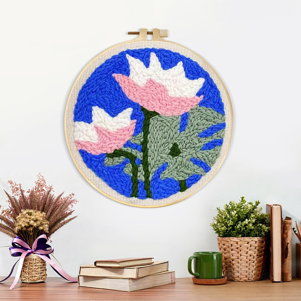 Finished pink and white lotus artwork displayed on a wall