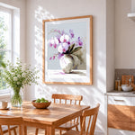 Pink and white orchids in a white vase cross stitch artwork displayed on wall as home decor