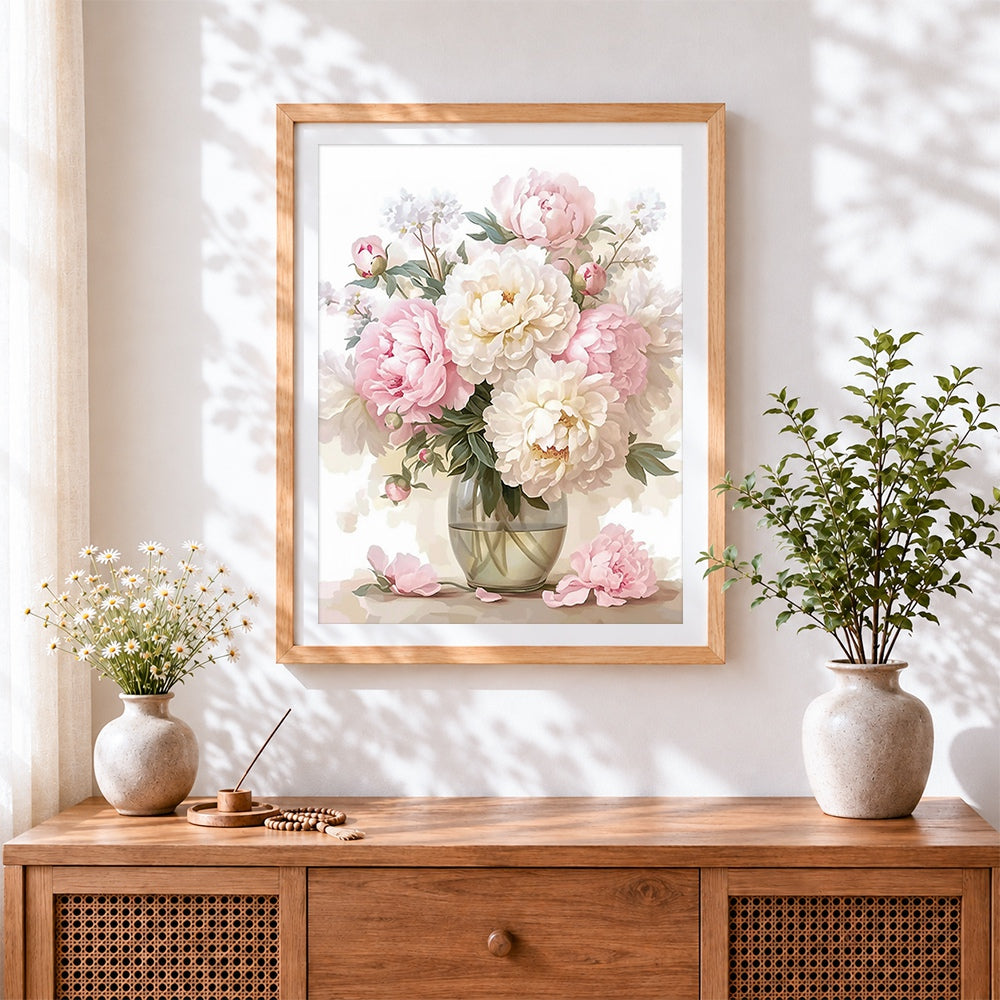 Finished pink and white peonies in a glass vase cross stitch artwork displayed