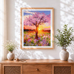 Finished pink blossom tree at sunset cross stitch artwork displayed