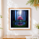 Finished pink blossom tree in moonlit forest cross stitch artwork displayed