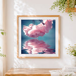 Finished pink blossoms with water reflection cross stitch artwork displayed